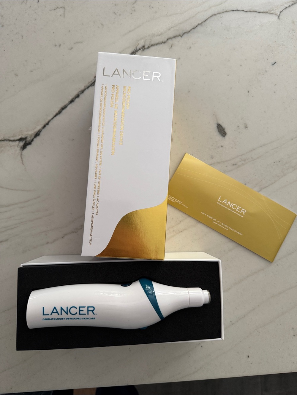 White & Teal Exfoliating Skin Device for Women